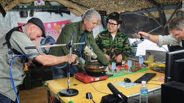 Anthony Bourdain preparing Budae Jjigea during a visit to Seoul