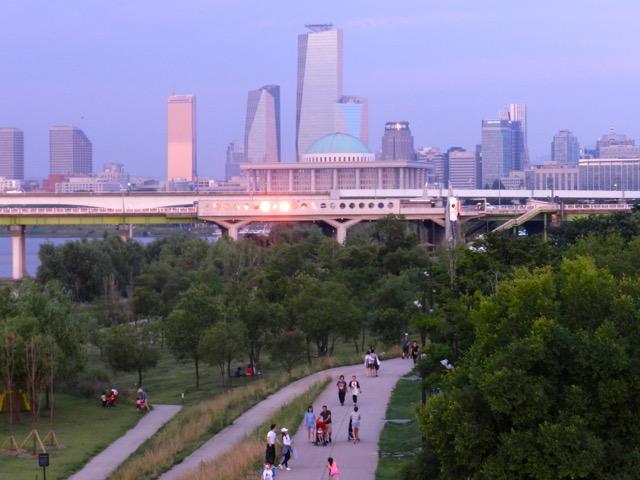 A view of the ROK National Assembly (building with the blue dome) Below is the Han River bicycle and pedestrian path. Trump will deliver a speech at the National Assembly on Wednesday, November 8, 2017. (Photo credit: Ned Forney)