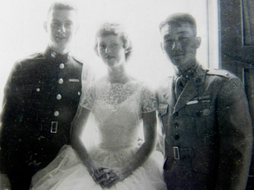 Capt. Ford with Bud and Jackie Ford at their wedding.