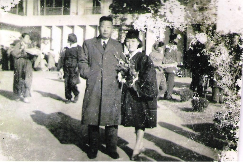 Maija Devine with her father at her college graduation, 1965