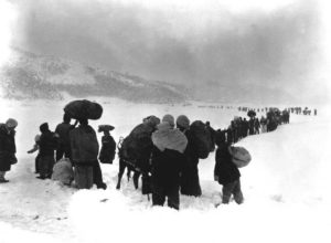 Civilians fleeing North Korea and walking towards Hungnam in December 1950.