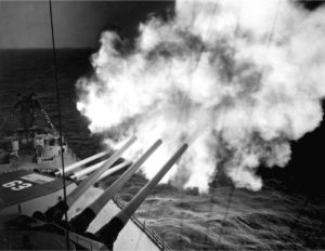 The USS Missouri, firing her 16" guns into the mountains surrounding Hungnam. (PC: US Navy)