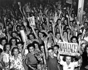 Women celebrating the end of WWII. (Photo credit: National Archives)