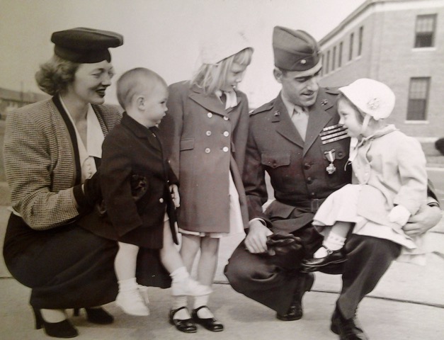 Bob Taplett and his wife Pat, with their first three children, Claire, Christine, and Robert, after his return from Korea, circa 1952.