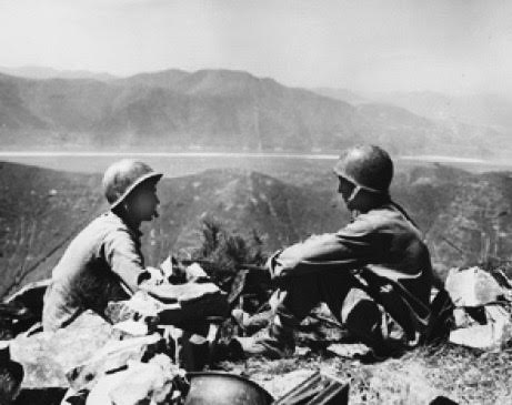 PFC Gene Obregon (left) and PFC Ralph Summers, with their .30cal machine gun, overlooking the Naktong River. The photo was taken on August 19, 1950, just five weeks before Obregon’s death.