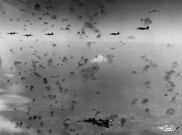 B-17s flying through German anti-aircraft flak. (PC: Zemper Collection, http://www.457thbombgroup.org)