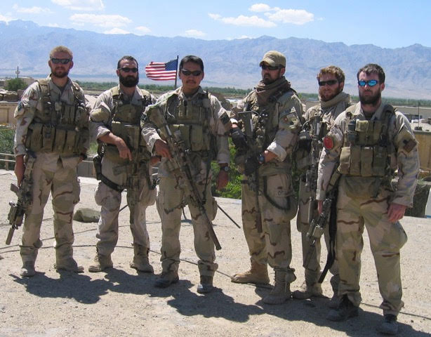 Lt. Murphy (far right) and his SEAL team: Sonar Technician -- Surface 2nd Class Matthew G. Axelson, 29, of Cupertino, Calif; Information Systems Technician Senior Chief Daniel R. Healy, 36, of Exeter, N.H.; Quartermaster 2nd Class James Suh, 28, of Deerfield Beach, Fla.; Hospital Corpsman Second Class Marcus Luttrell); Machinist Mate 2nd Class Eric S. Patton, 22, of Boulder City, Nev.; LT Michael P. Murphy, 29, of Patchogue, N.Y. With the exception of Luttrell, all were killed on June 28, 2005 in Afghanistan. (PC: US Navy)