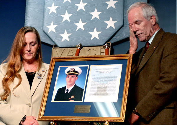Maureen and Daniel Murphy, the parents of U.S. Navy Lt. Michael P. Murphy, during his induction into the Hall of Heroes at the Pentagon, Oct. 23, 2007. (PC: DOD, U.S. Navy Petty Officer 2nd Class Molly A. Burgess)