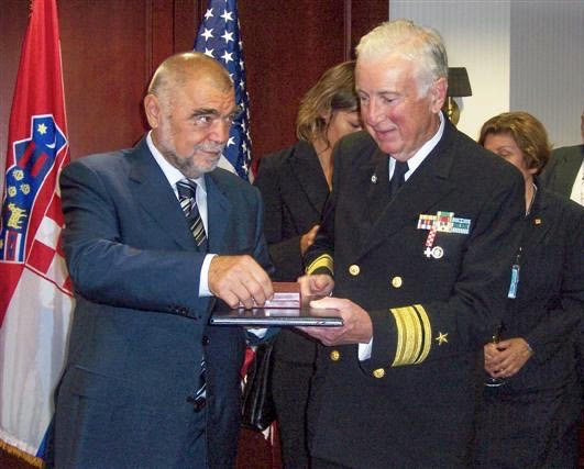 President of Croatia Stjepan Mesić presents the Order of the Croatian Trefoil to Admiral J. Robert Lunney