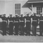 Montford Point Marines proudly saluting in their dress uniforms, circa 1943.