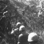 A Marine rifle platoon moves toward the enemy. June, 1952.