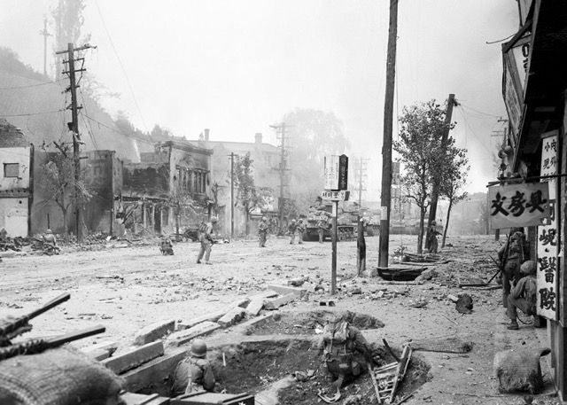 Marines fight street to street in Seoul, September 1950.