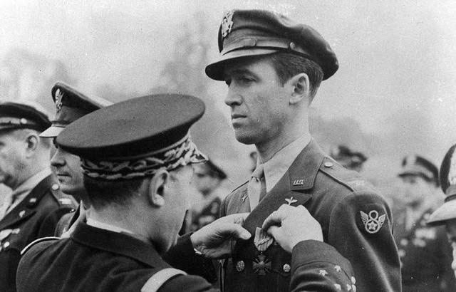 Lt. Gen. Valin, Chief of Staff, French Air Force, awards the Croix De Guerre with Palm to Col. Jimmy Stewart for exceptional services in the liberation. (U.S. Air Force photo)